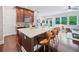 Open-concept kitchen boasts a large island with seating, granite countertops, and stainless steel appliances at 2801 Avington Se Ln, Smyrna, GA 30080
