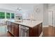 Bright kitchen featuring a large center island with a stainless steel dishwasher and an open-concept design at 2801 Avington Se Ln, Smyrna, GA 30080