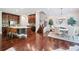 Spacious living area with hardwood floors, a modern kitchen, and adjacent dining room at 2801 Avington Se Ln, Smyrna, GA 30080