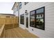Rear deck on a townhome-style residence, offering privacy and a view of the neighborhood at 4253 Millcroft Pl # 198, Buford, GA 30518