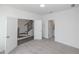 Spacious bedroom offers a view of the staircase and attached bathroom at 4253 Millcroft Pl # 198, Buford, GA 30518