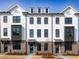 Beautiful townhomes feature a brick facade and modern architectural details at 4253 Millcroft Pl # 198, Buford, GA 30518