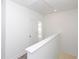 Hallway features white walls and trim with access to multiple rooms in the home at 4253 Millcroft Pl # 198, Buford, GA 30518