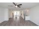 Living room boasts hardwood floors and an open layout connecting kitchen and staircase at 4253 Millcroft Pl # 198, Buford, GA 30518