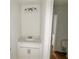 Powder room featuring a single vanity with modern fixtures at 7252 Eton Ln, Locust Grove, GA 30248