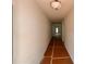 Bright hallway leading into the home showcasing neutral walls and floors ready for finishing at 7252 Eton Ln, Locust Grove, GA 30248