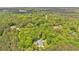 Lush wooded acreage, home with a green roof, and an inviting pool for outdoor relaxation and enjoyment at 4332 Brushy Mountain Rd, Rockmart, GA 30153