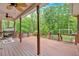 Large back porch overlooking wooded backyard at 4332 Brushy Mountain Rd, Rockmart, GA 30153