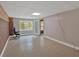 Finished basement with paneled walls, drop ceiling, and windows offering natural light at 4332 Brushy Mountain Rd, Rockmart, GA 30153