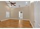 Primary bedroom with hardwood floors, large window and ensuite bath at 4332 Brushy Mountain Rd, Rockmart, GA 30153