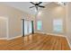 Bedroom featuring a ceiling fan, natural light, and shiny hardwood floors at 4332 Brushy Mountain Rd, Rockmart, GA 30153