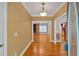 Foyer entrance featuring hardwood floors that lead to the living room and dining room at 4332 Brushy Mountain Rd, Rockmart, GA 30153