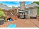 Brick home featuring an outdoor kitchen, bar, and outdoor seating area at 4332 Brushy Mountain Rd, Rockmart, GA 30153