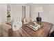 Inviting office space showcases a sleek desk, decorative vases, and cozy chairs for a welcoming feel at 9454 Pinecrest Path # 315, Jonesboro, GA 30238