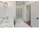Bright bathroom boasts a shower and a vanity with ample counter space at 979 Bridgegate Ne Dr, Marietta, GA 30068