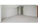 Bonus room with white carpet, bright window, and open doorway to another area at 979 Bridgegate Ne Dr, Marietta, GA 30068