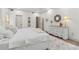 Bright main bedroom boasts ample natural light, neutral decor, and faux fur rug at 979 Bridgegate Ne Dr, Marietta, GA 30068