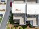 Birds-eye view of townhome roofs and patios, highlighting the layout of private outdoor living spaces within the community at 2171 Burnside Dr Nw, Atlanta, GA 30318
