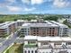 Aerial view of modern apartments and townhomes against a skyline, showcasing urban living with outdoor terraces and lush landscaping at 2171 Burnside Dr Nw, Atlanta, GA 30318