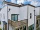 Relax on this spacious balcony overlooking the neighborhood with wooden railing that offers an outdoor retreat at 2171 Burnside Dr Nw, Atlanta, GA 30318