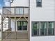 This is a beautiful, cozy balcony area with wooden rails that offers an inviting outdoor space at 2171 Burnside Dr Nw, Atlanta, GA 30318