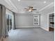 Spacious bedroom with slider door, large window, and gray walls at 2171 Burnside Dr Nw, Atlanta, GA 30318