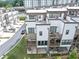 A charming residential community with modern architecture featuring balconies, well-manicured lawns, and inviting curb appeal at 2171 Burnside Dr Nw, Atlanta, GA 30318