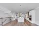 Spacious kitchen with stainless steel appliances, a waterfall island and stairs at 2171 Burnside Dr Nw, Atlanta, GA 30318