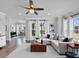 Comfortable living room featuring hardwood floors, neutral decor, and lots of natural light at 2171 Burnside Dr Nw, Atlanta, GA 30318