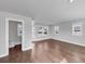Bright living room with hardwood floors and natural light from windows at 2171 Burnside Dr Nw, Atlanta, GA 30318