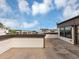 Spacious patio with light stone flooring and white and brown siding offering great city views at 2171 Burnside Dr Nw, Atlanta, GA 30318