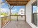 Inviting wooden porch with views of the community at 2171 Burnside Dr Nw, Atlanta, GA 30318