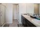 Bathroom with double sink vanity, a walk-in shower, and neutral wall colors at 2631 Lovejoy Crossing Dr, Hampton, GA 30228