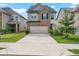 Charming two-story home with a well-maintained front yard and long driveway at 2631 Lovejoy Crossing Dr, Hampton, GA 30228