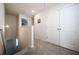 Upstairs hallway featuring access to rooms, storage and carpeted floors at 2631 Lovejoy Crossing Dr, Hampton, GA 30228