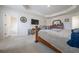 Spacious main bedroom with coffered ceilings, carpet flooring, and an en-suite bathroom at 2631 Lovejoy Crossing Dr, Hampton, GA 30228