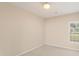 Neutral bedroom with carpeted floors, a ceiling fan and natural light at 310 Autumn Glen Cir, Fayetteville, GA 30215