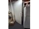 Basement area featuring a white refrigerator, closed door and some storage at 3978 Devonshire Dr, Marietta, GA 30066