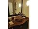 Bathroom features a copper sink and black wooden cabinets at 3978 Devonshire Dr, Marietta, GA 30066