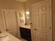 Bathroom features a vanity with light countertop and dark wood cabinet at 3978 Devonshire Dr, Marietta, GA 30066