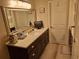 Bathroom features a light countertop, and a dark wood cabinet at 3978 Devonshire Dr, Marietta, GA 30066