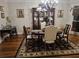 Dining room featuring hardwood floors, china cabinet, and table with seating at 3978 Devonshire Dr, Marietta, GA 30066