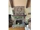 Stone fireplace with decorative mantel and hearth, wooden beams, and plank ceilings at 3978 Devonshire Dr, Marietta, GA 30066