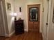 Inviting hallway with hardwood floors and a decorative stained glass entry door at 3978 Devonshire Dr, Marietta, GA 30066