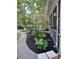 Lush landscaping, including a fountain and flower baskets, adds charm to this home's exterior at 3978 Devonshire Dr, Marietta, GA 30066