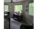 This office features natural light from two windows with a view of lush, green trees at 3978 Devonshire Dr, Marietta, GA 30066