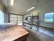 Garage interior with room for storage and a workbench at 53 Villa Rosa Way, Temple, GA 30179