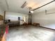 Garage interior with plenty of space for storage and projects at 53 Villa Rosa Way, Temple, GA 30179
