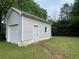 Detached garage with two doors and a window on a lot at 53 Villa Rosa Way, Temple, GA 30179