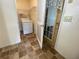 Laundry room including a dryer and access to backyard at 53 Villa Rosa Way, Temple, GA 30179